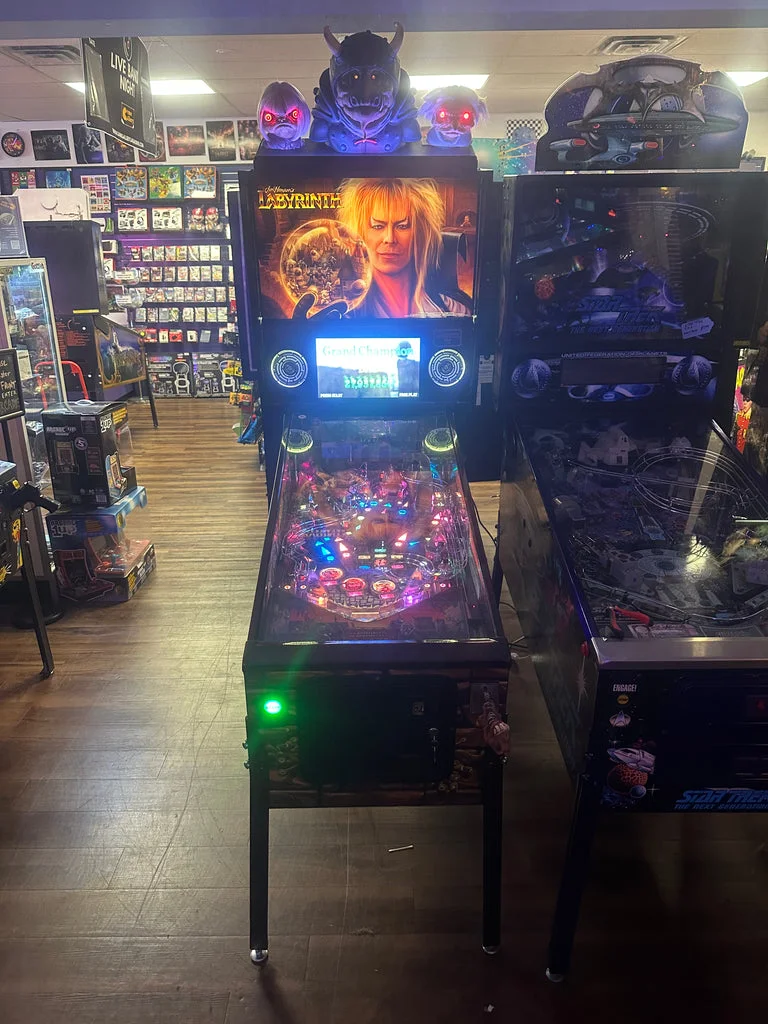 Jim Henson’s Labyrinth Pinball Machine with Official Topper for sale